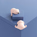 Soft silicone corner guards in a playful pink bear design. Ideal for childproofing tables and furniture edges. Strong adhesive for secure attachment. Pack of 4.