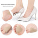 adhesive pads applied to heel, toe, and side of foot for blister prevention