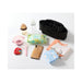 Collection of baby care items including a bottle, wipes, and a phone on a white background.