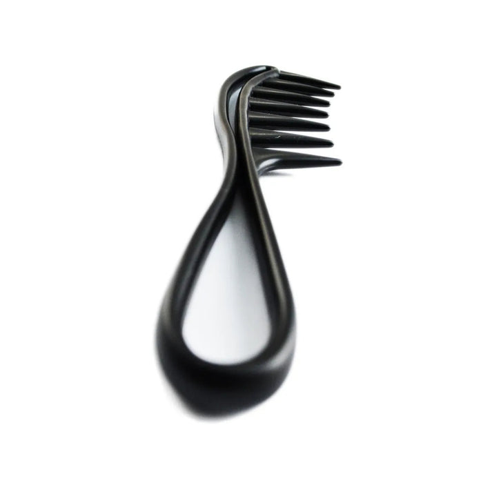 Ergonomic non-slip handle comb held in hand for size reference