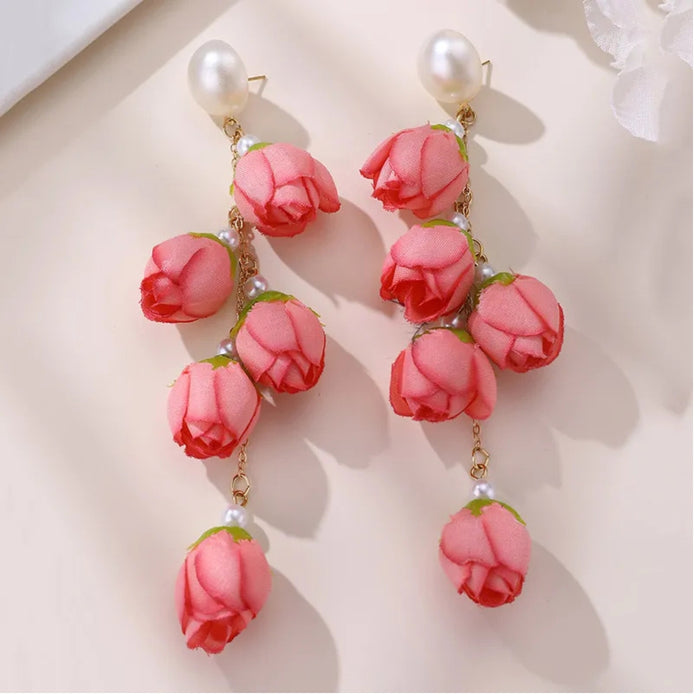 Digital Shoppy red bud earrings – pearl stud with cascading red rosebuds and green sepals on gold chain

