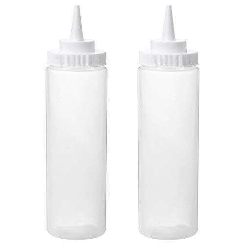 Two white condiment bottles with caps on a white background