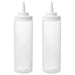 Two white condiment bottles with caps on a white background