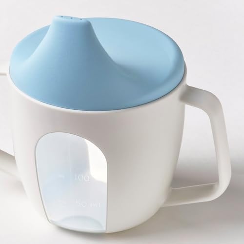 White mug with a blue lid on a light gray background
