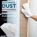 Electrostatic dust removal gloves trapping dust, dirt, and hair on furniture surfaces