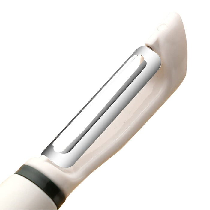 Multi-functional cabbage grater and fruit peeler tool for slicing and peeling vegetables.