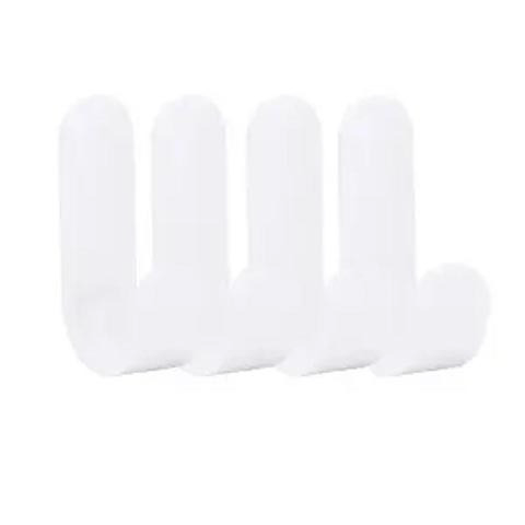 Close-up of transparent non-marking hook attached to a wooden door