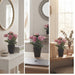 IKEA FEJKA artificial plant styled on desk beside books and mirror