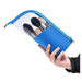 Blue makeup brush pouch held by a hand with brushes inside on a white background