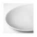 White ceramic plate with geometric pattern on a white background