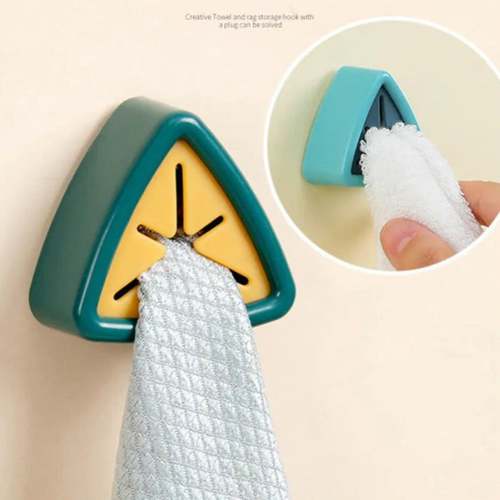 Triangle-shaped towel and rag holder with a close-up of a hand holding a white towel.