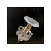 Metallic valve stem cap on a dark background