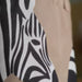IKEA SANDLÖPARE storage bag – close-up of zebra print fabric and reinforced beige handle stitching – 50603215

