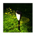 Solar-powered garden light with musical notes on a grassy background