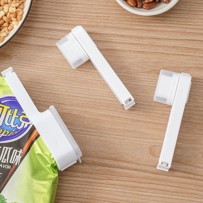Space-saving food storage clips stacked in kitchen drawer
