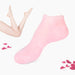 Pink socks with a minimal background and pink petals