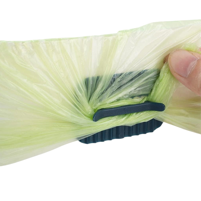 Digital Shoppy 4 Anti-slip Fixers For Household Garbage Bags, hand demonstrating clip sealing green plastic bag