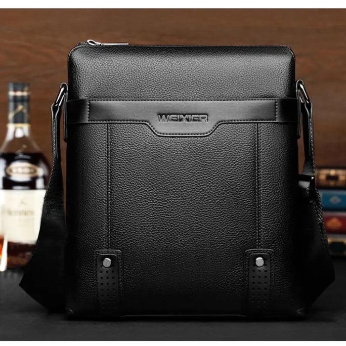 Black PU leather men’s messenger bag a smooth strip, adjustable shoulder strap, and silver hardware—28 x 25 cm – 477335 12798521.