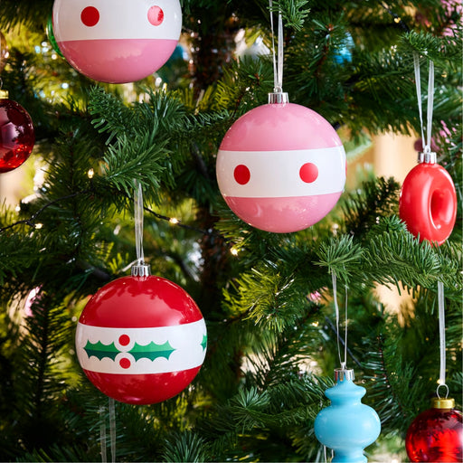VINTERFINT baubles styled on a festive Christmas tree with donut-shaped and light blue ornaments, adding vibrant seasonal charm