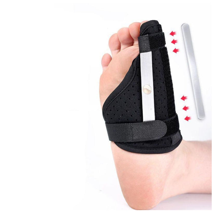 Black wrist support brace on a hand with a white background