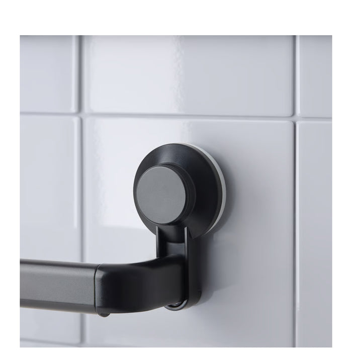 IKEA TISKEN towel rack – close-up of suction cup bracket on white tiled wall, no-drill mounting design-20498541