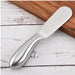 Digital Shoppy Multi-functional Cheese Knife, placed on white wooden surface with cutting board background