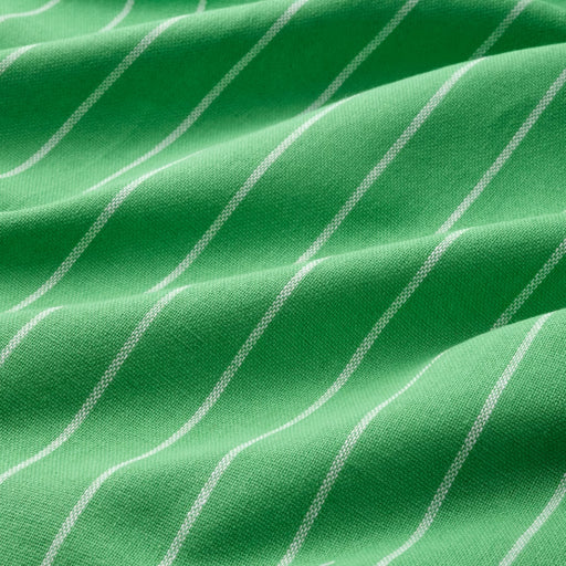 Close-up of green fabric with white stripes