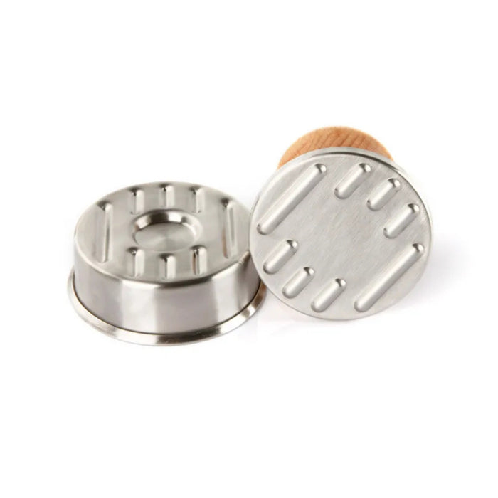 Two metal bottle caps with cork on a white background