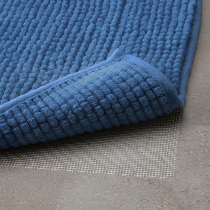 Compact bright blue bath mat from IKEA TOFTBO collection