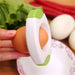 Sharp stainless steel blades on egg topper for smooth, crack-free cuts every time.