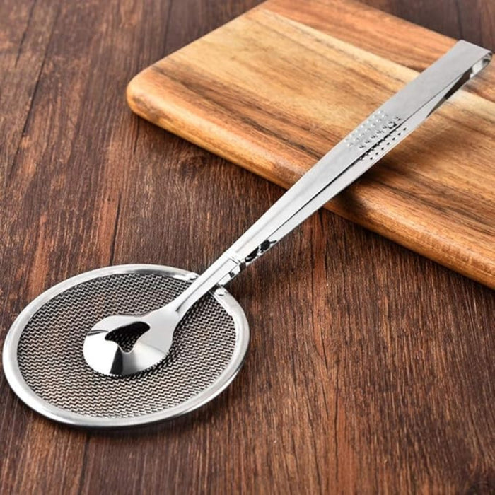 Metallic strainer on a wooden surface