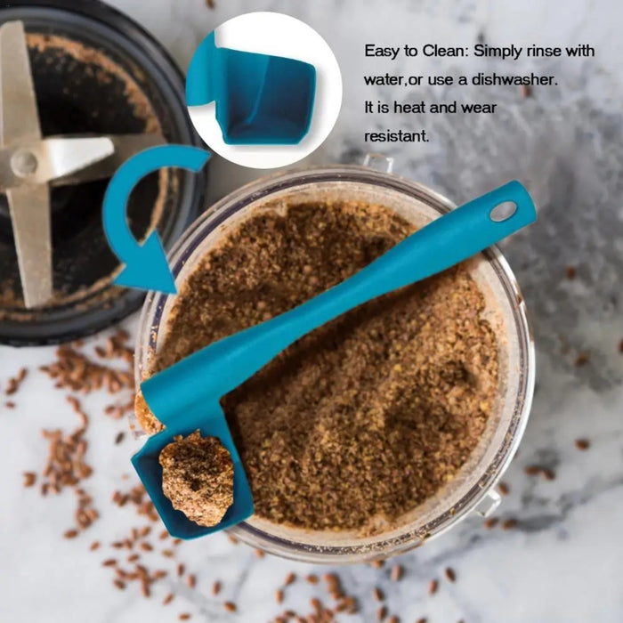 Blue measuring scoop resting in flaxseed grinder – flat edge and hanging hole design for easy cleaning and storage – 777701 13962262