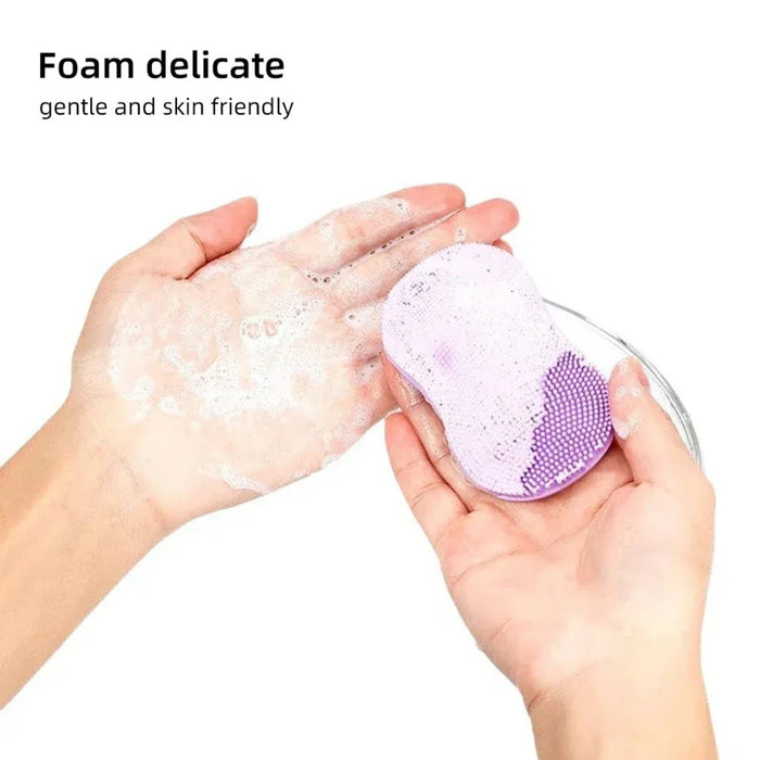 Purple silicone cleansing scrubber, 2pcs; mini finger glove design with soft bristles – shown foaming in hand wash – gentle, skin-friendly for face and baby bath – 860000022226113652836