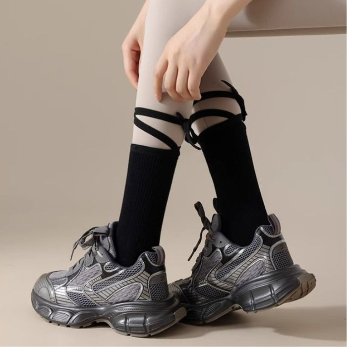 Digital Shoppy Foot Sole Non-slip Yoga Socks – Black socks with ribbon straps styled over tights and chunky sneakers