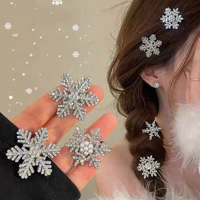 Crystal snowflake jewelry – earrings and rings worn with braided hair and fluffy white garment