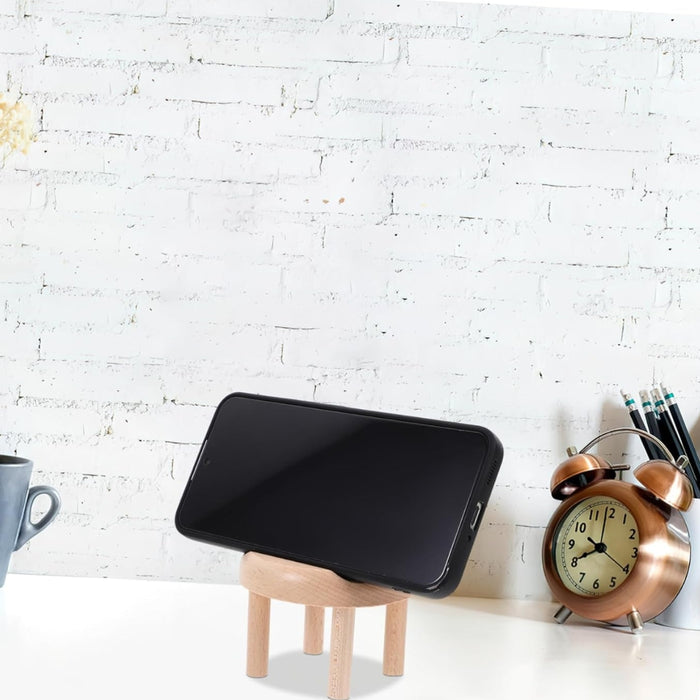 Smartphone resting on mini wooden chair stand beside vintage clock and mug – stylish phone holder for organized workspace – 1598453326009 13953547