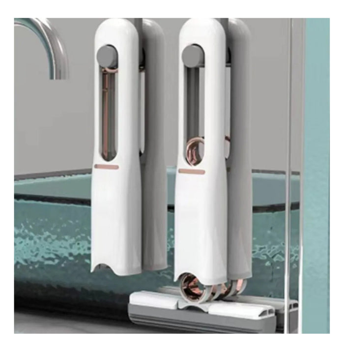 Window cleaning tool with squeegee and scrubber on a glass surface