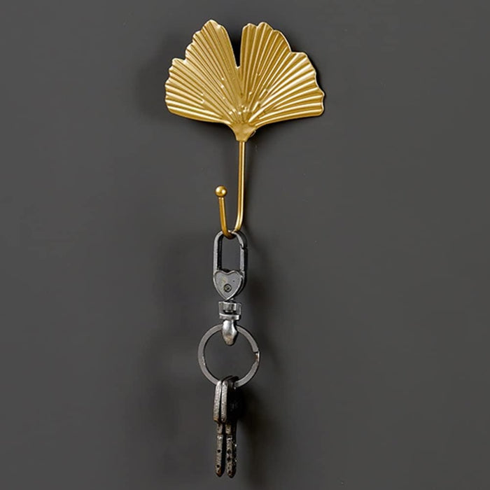 Gold ginkgo leaf hook – decorative wall hanger with rounded tip for coats or keys