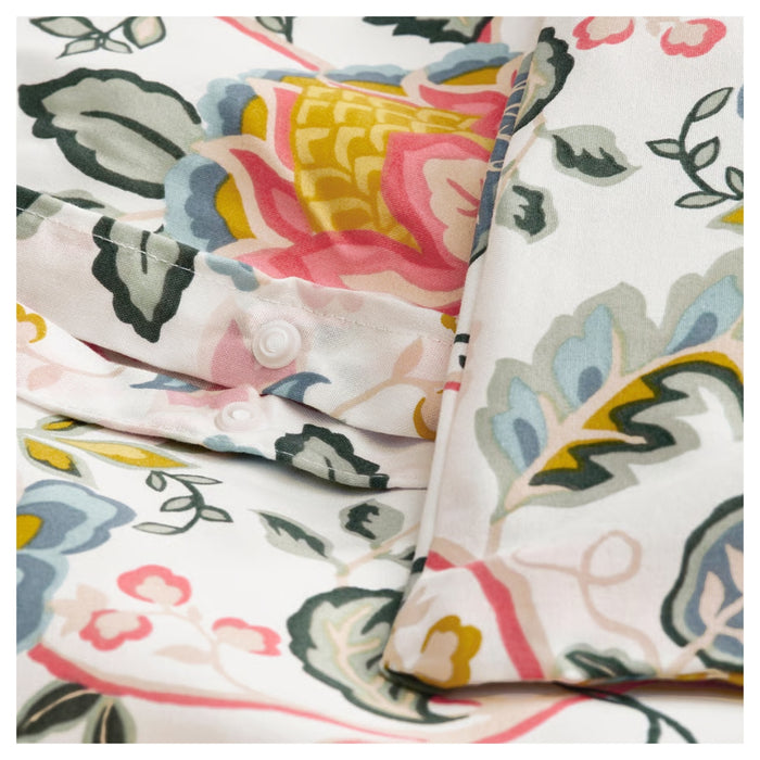 Floral patterned fabric with colorful leaves on a white background
