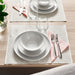 IKEA GODMIDDAG Bowl, white, 16 cm (6 ½ "), set inside plate on dining table with cutlery and glasses - 40585028