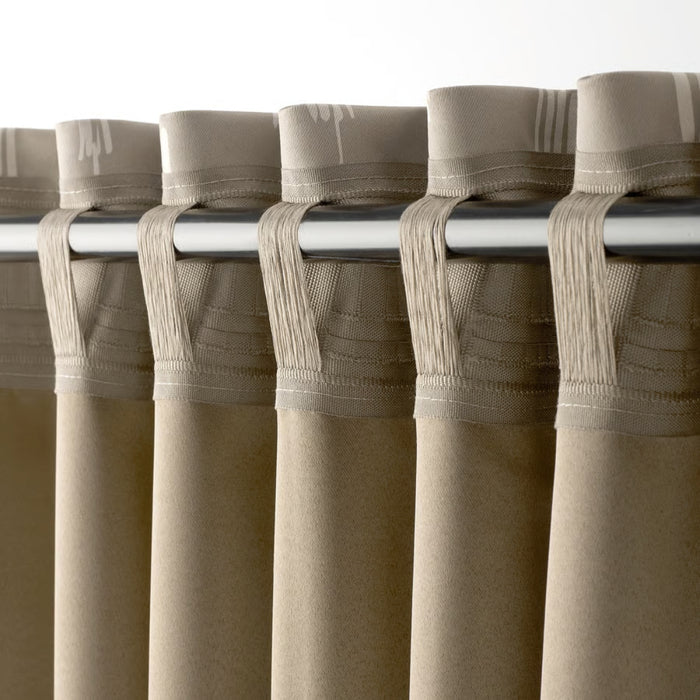  Close-up of tab-top curtain design with evenly spaced fabric loops for easy installation on rod