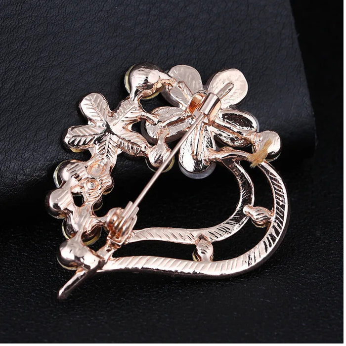 Digital Shoppy opal brooch – heart-shaped rose gold pin with floral accents and embedded rhinestones

