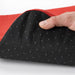 Close-up of STAGGSTARR underside showing black anti-slip surface with white grip dots