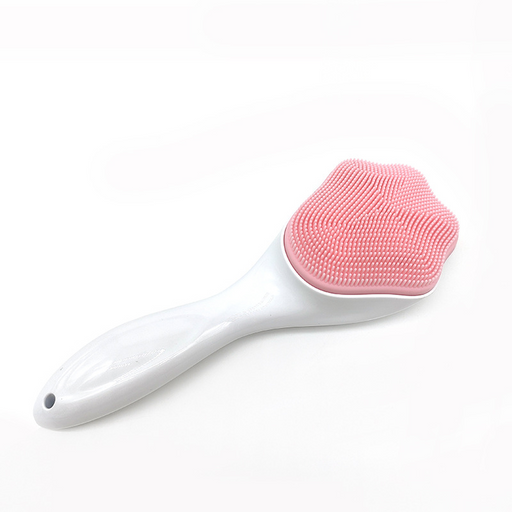 Silicone face brush with soft bristles on a white background