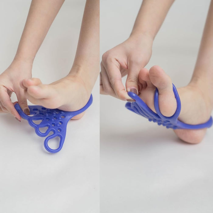 Blue toe orthosis – hands adjusting blue toe separator on foot for bunion relief and plantar fasciitis support