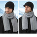 Digital Shoppy woolen cap – black ear protection hat worn in snowy mountain setting with grey scarf and black coat

