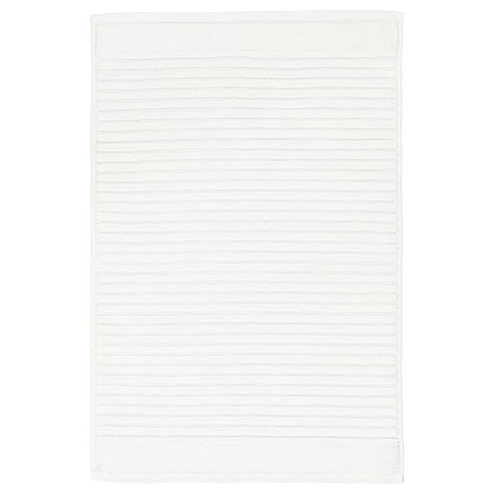 White bath mat from IKEA with plush texture for added safety and comfort  90439322