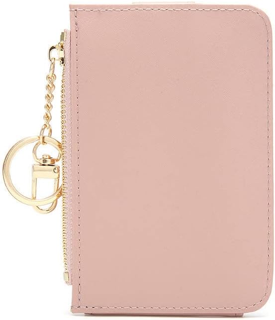 Pink wallet with gold zipper and keychain on a white background