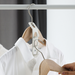 Space-saving white plastic hooks set that easily attaches to hangers for extra storage capacity