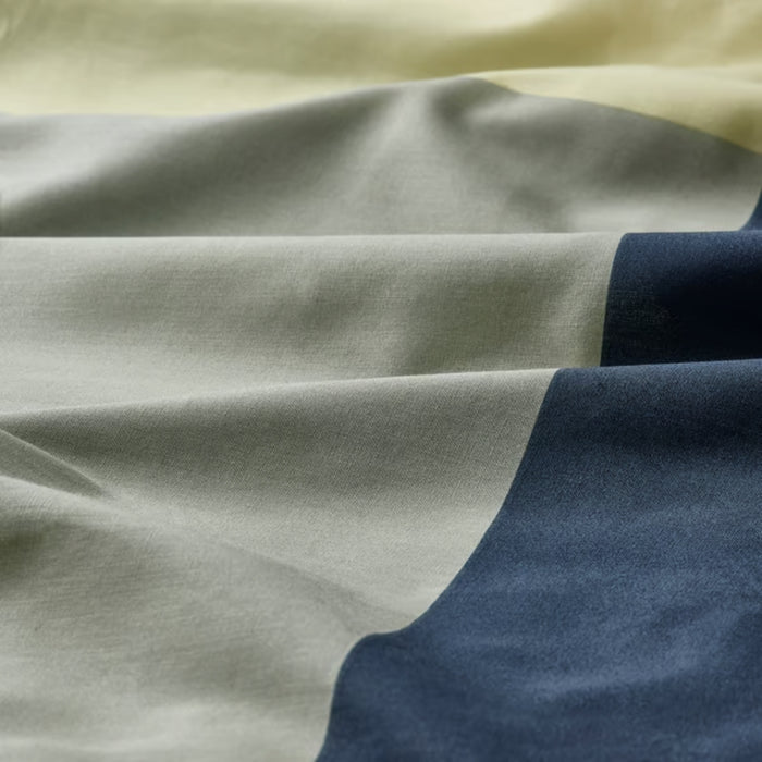 BRUNKRISSLA pillowcase, green/multicolour, 50x80 cm. Horizontal stripes in yellow, grey, and dark blue – soft cotton fabric with gentle folds – adds playful texture – 90577083.